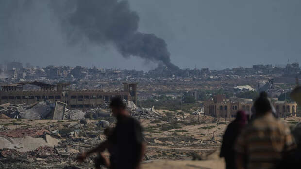 Дым на месте израильского удара в секторе Газа - РИА Новости, 1920, 29.10.2025