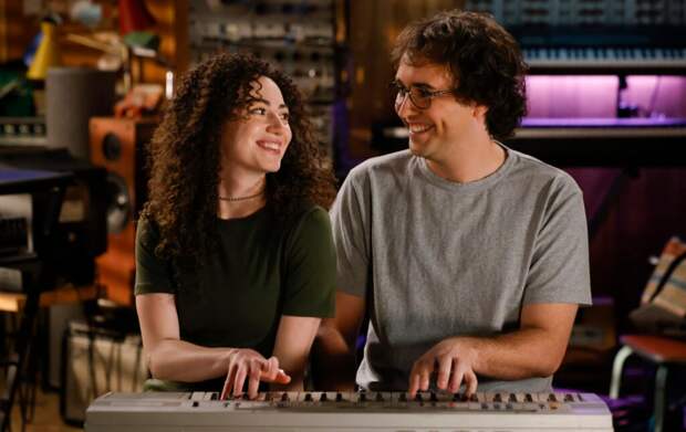 Connor and Chloe smile at each other while playing the keyboard on Georgie & Mandy's First Marriage Season 1 Episode 18