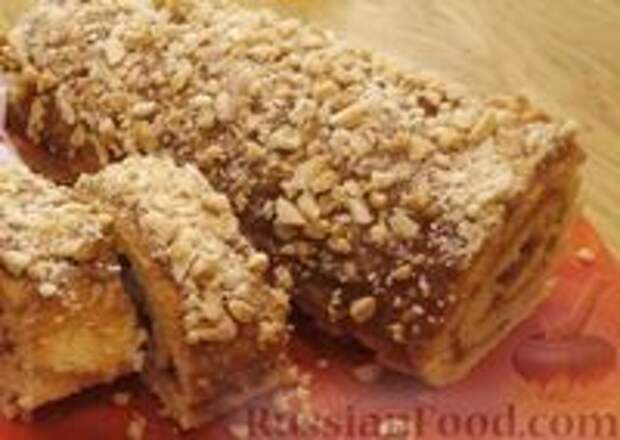 Фото к рецепту: Быстрый бисквитный рулет с вареной сгущенкой и орехами Фото к рецепту: Быстрый бисквитный рулет с вареной сгущенкой и орехами