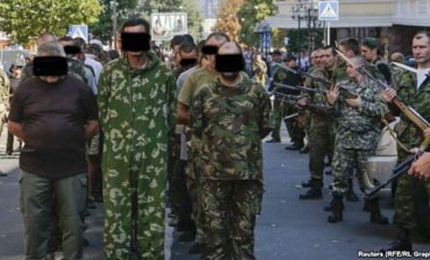 В Human Rights Watch осуждают "марш военнопленных" в Донецке В Human Rights Watch осуждают "марш военнопленных" в Донецке
