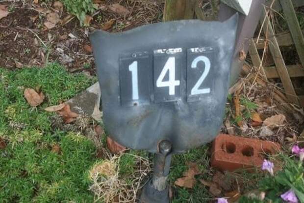 shovel repurposed as address sign: 