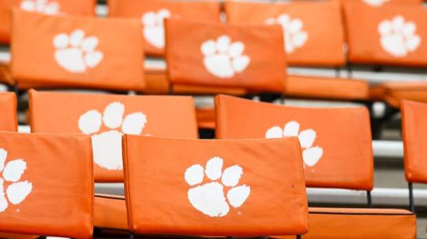 Clemson Tigers logos on seats at Memorial Stadium.