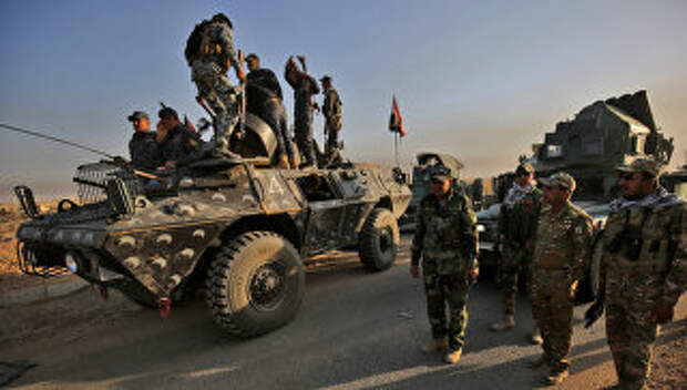 Колонна правительственных сил во время наступления на Мосул в Ираке. Архивное фото