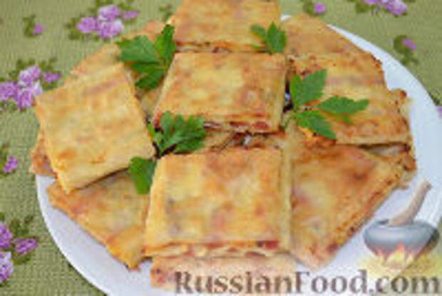 Фото к рецепту: Жареный лаваш с колбасой и сыром
