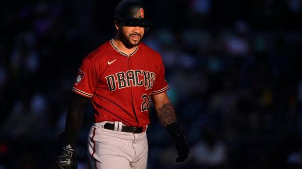 Tommy Pham walks onto the field during a recent Diamondbacks game.