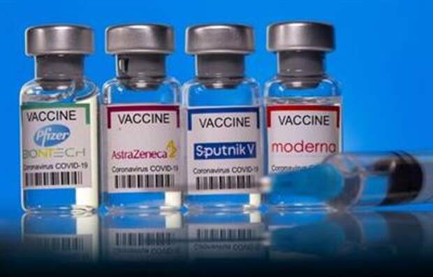 Vials with Pfizer-BioNTech, AstraZeneca, Sputnik V, and Moderna coronavirus disease (COVID-19) vaccine labels are seen in this illustration picture taken March 19, 2021. REUTERS/Dado Ruvic/Illustration