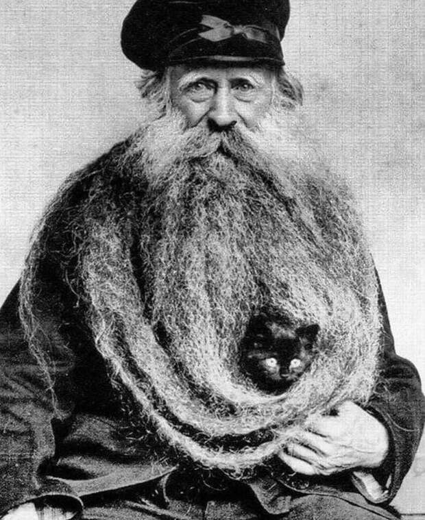 Это Луи Кулон — человек с 3-метровой бородой, в которую он частенько заворачивал свою кошку