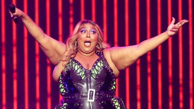 lizzo singing at a concert
