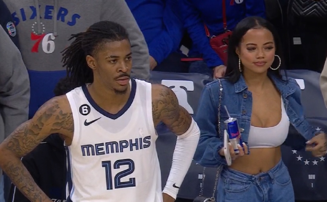 Ja Morant standing next to IG model at Sixers-Grizzlies games 