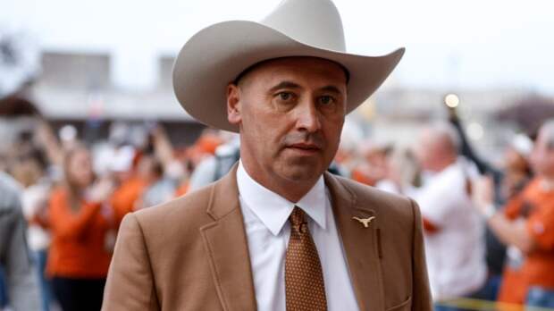 Steve Sarkisian walks into the stadium before Texas's bowl game.