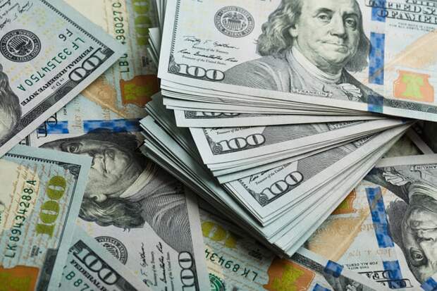 stacks of $100 bills