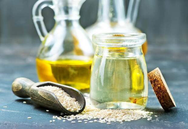 sesame-oil-in-bottle-and-on-a-table