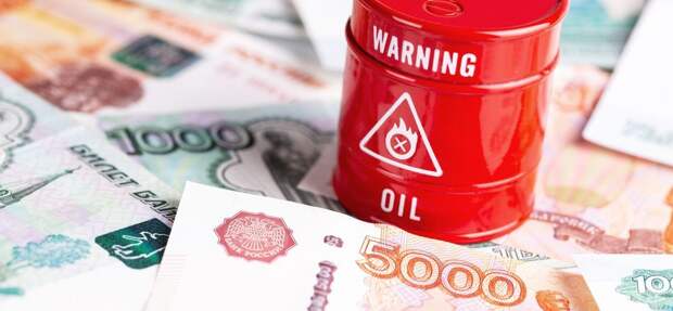 Рубль растет против падения нефти