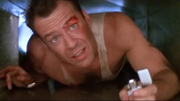 Bruce Willis as John McClane in Die Hard.