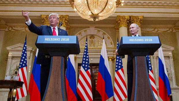Президент США Дональд Трамп и президент России Владимир Путин во время встречи в Хельсинки, июль...