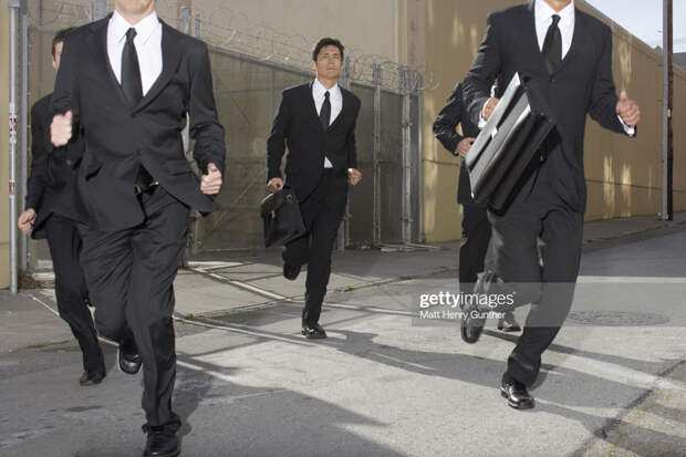 Businessmen running Businessmen running