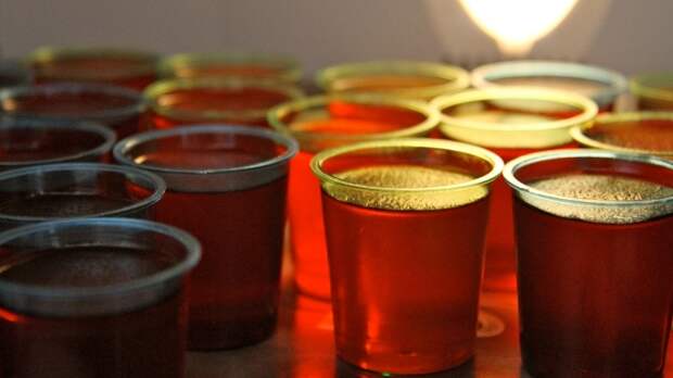 An image of Jello-shots on a bar.
