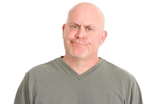 Person grimacing, looking doubtful or distrustful.