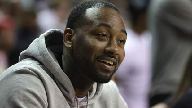 John Wall sits on the bench.