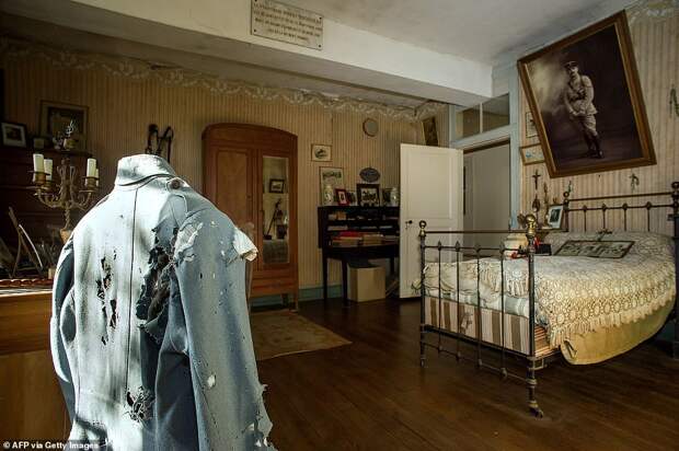 Today the dust-covered bed, military jacket and items of furniture are still lying where he left them 102 years ago