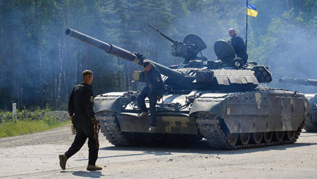 Украинские военные из 14-й волынской механизированной бригады ВСУ на танке Т-84 во время соревнований Strong Europe Tank Challenge в городе Графенвер, Германия. 6 июня 2018 Украинские военные из 14-й волынской механизированной бригады ВСУ на танке Т-84 во время соревнований Strong Europe Tank Challenge в городе Графенвер, Германия. 6 июня 2018