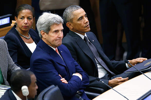 U.S. President Barack Obama (R) attends a United Nations meeting on the Ebola outbreak, in New York September 25, 2014. With Obama are National Security Advisor Susan Rice and Secretary of State John Kerry.  