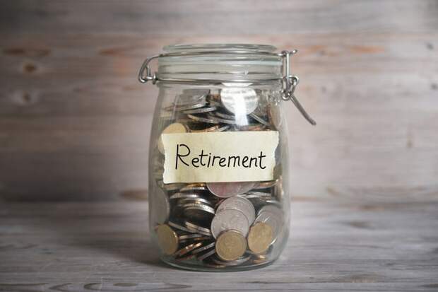 A jar full of coins labeled Retirement.