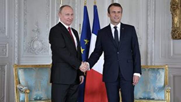 Президент России Владимир Путин и президент Франции Эммануэль Макрон. Архивное фото