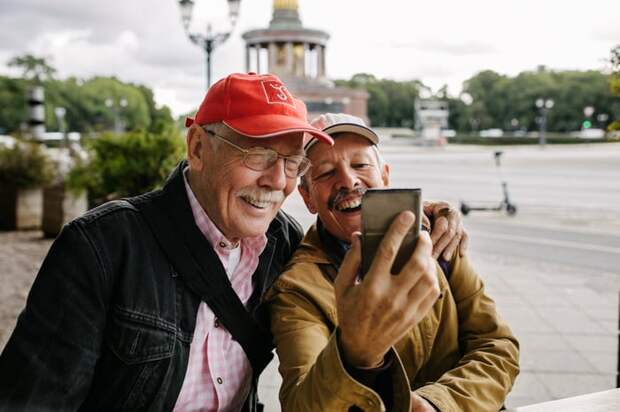 Two adults taking a selfie on a trip.