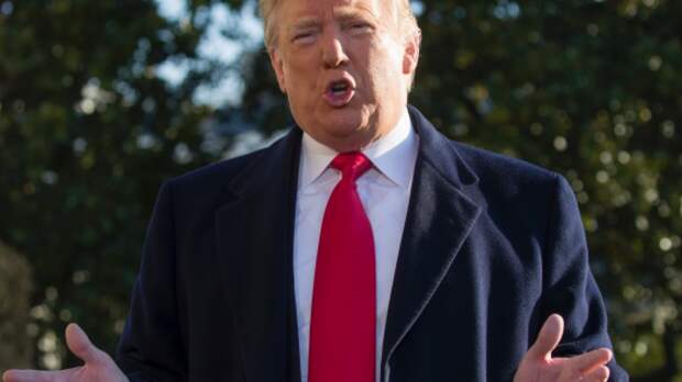 President Donald Trump speaks on the South Lawn of the White House as he walks to Marine One, Sunday, Jan. 6, 2019, in Washington. Trump is en route to Camp David. (AP Photo/Alex Brandon)