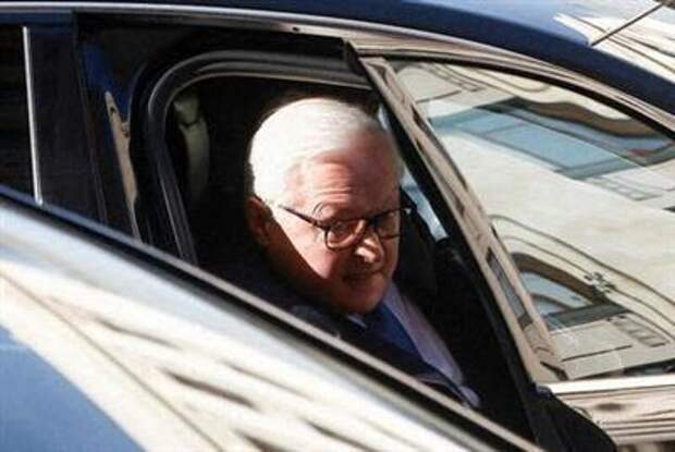 Russia's Deputy Foreign Minister Sergei Ryabkov sits into a car after talks with U.S. Under Secretary of State Victoria Nuland in Moscow, Russia October 12, 2021. REUTERS/Maxim Shemetov