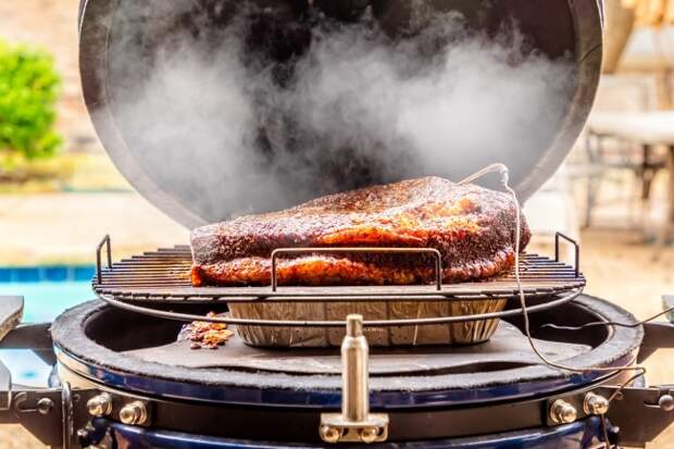 Fresh smoked Texas bbq brisket on the grill