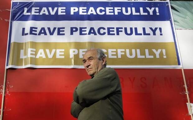 A man listens during an opposition rally in Tbilisi