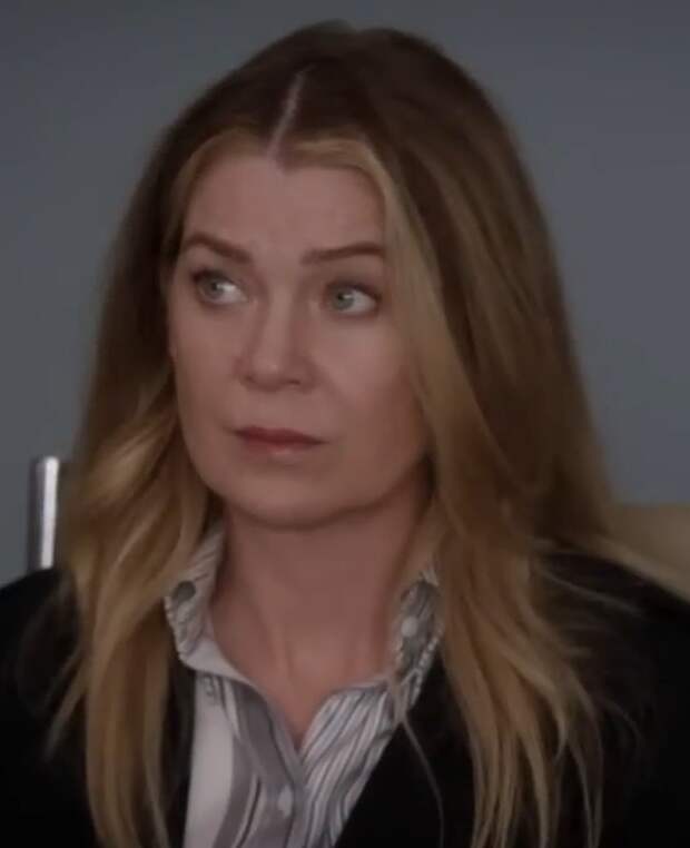 Meredith looks concerned.
