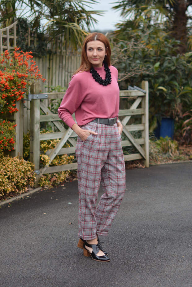 Soft pink, grey plaid trousers and black cut away heels