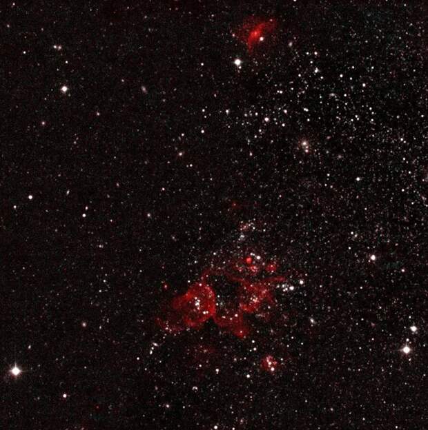 Фото: Алексей Моисеев и Елена Барсукова / Карликовая галактика IC1613, удаленная от нас на 2,3 миллиона световых лет. Фотография получена при помощи метрового телескопа Zeiss-1000 и прибора SCORPIO, принадлежащих Специальной астрофизической обсерватории на Северном Кавказе Фото: Алексей Моисеев и Елена Барсукова / Карликовая галактика IC1613, удаленная от нас на 2,3 миллиона световых лет. Фотография получена при помощи метрового телескопа Zeiss-1000 и прибора SCORPIO, принадлежащих Специальной астрофизической обсерватории на Северном Кавказе