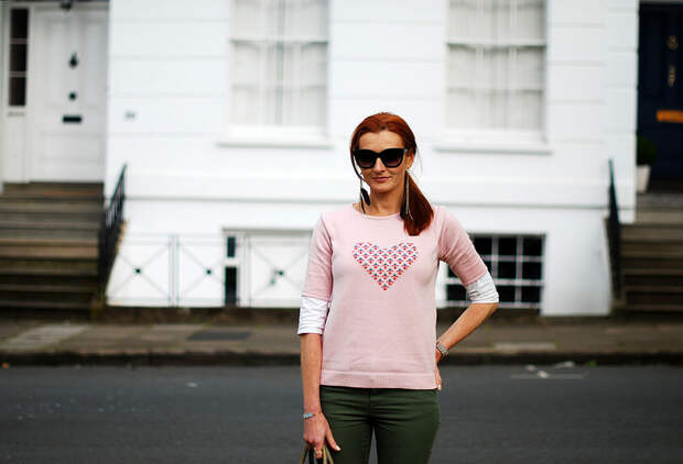 Pink motif sweater & olive skinnies