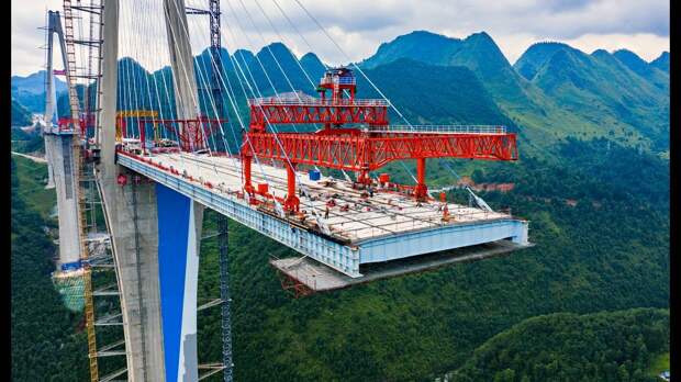 Картинки по запросу Китайцы построили мост-небоскреб