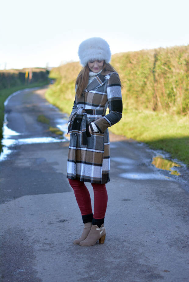 Winter neutrals: Oversized feather cossack hat and check coat