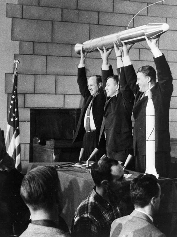 The creators of Explorer 1 holding a model of it on the press conference at launch day (or the day before), February 1, 1958 (or January 31, 1958). Starting from left side: Ph.D. William Pickering, Ph.D. James Van Allen, Ph.D. Wernher von Braun