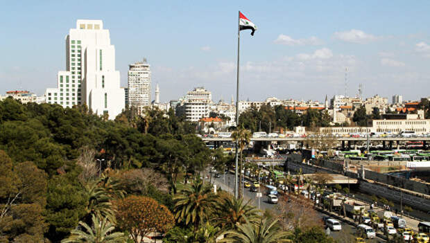 Флаг Сирии в Дамаске. Архивное фото.