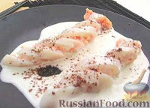 Фото к рецепту: Фаршированный кальмар