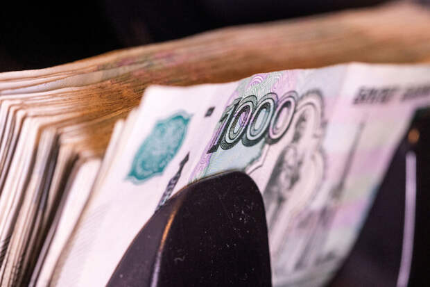 Курс доллара опустился ниже 91 рубля впервые с 7 мая