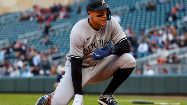 Aaron Judge stands up after sliding on the basepaths.