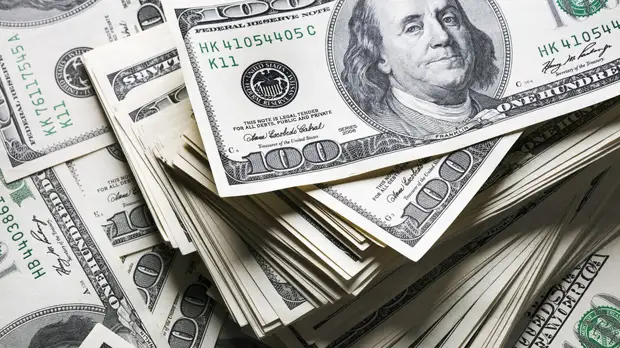 Курс доллара опустился ниже 73 рублей