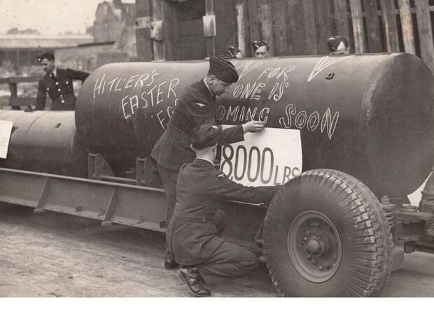 RAF 207 Squadron Members With A 8000lb Bomb And A Few Personal Messages For Someone , At Wings For Victory Week In Trafalgar Square 1943.
