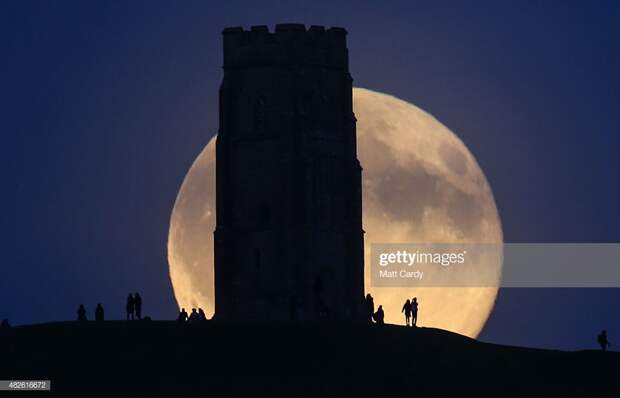 Blue Moon Rises Over Glastonbury Tor : News Photo
