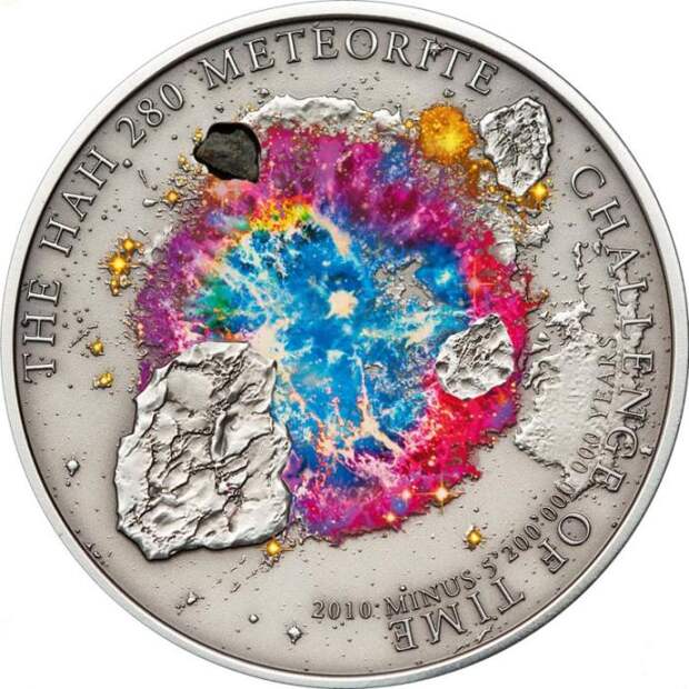Монета с куском метеорита./Фото: coinsfromworld.com