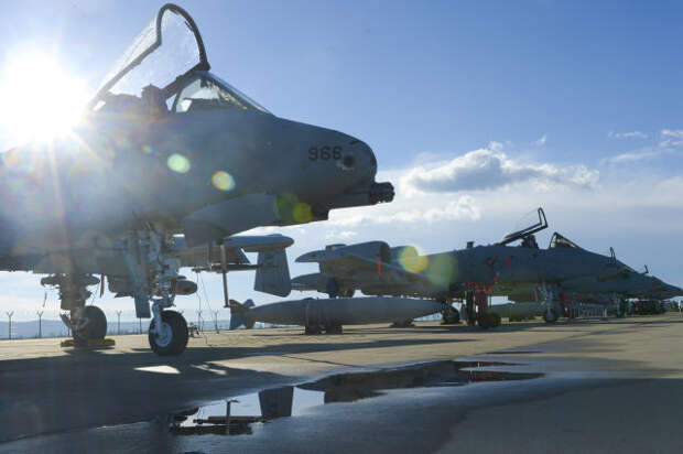 A row of U.S. Air Force A-10 Thunderbolt IIs assigned to the 354th Expeditionary Fighter Squadronare parked off the runway during a theater security package deployment at Campia Turzii, Romania, April 1, 2015.  The aircraft deployed to Romania in support of Operation Atlantic Resolve to bolster air power capabilities while underscoring the U.S. commitment to European security and stability. (U.S. Air Force photo by Staff Sgt. Joe W. McFadden/Released)
