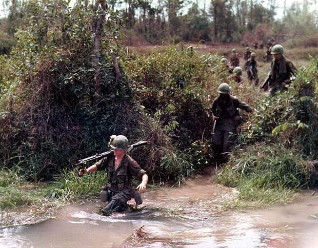 Файл:Wading Through Vietnam River.jpg